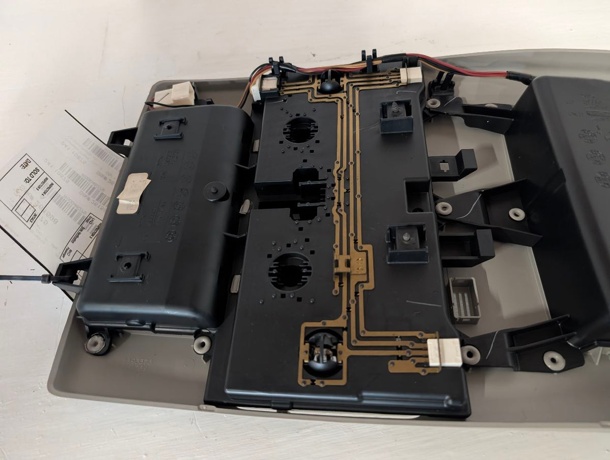 Overhead Console from a 2010 Toyota Tundra, front, photo 7