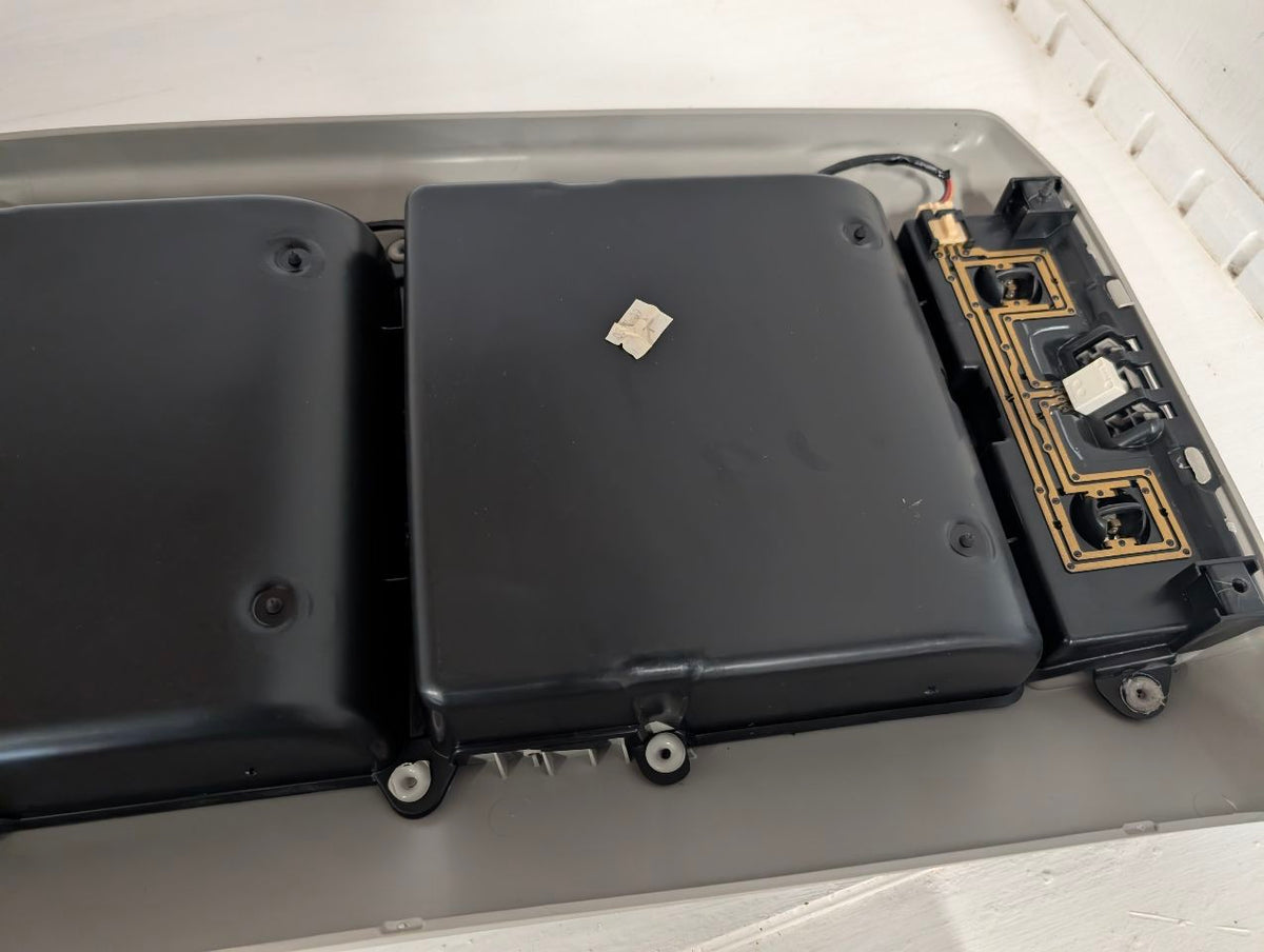 Overhead Console from a 2010 Toyota Tundra, front, photo 8