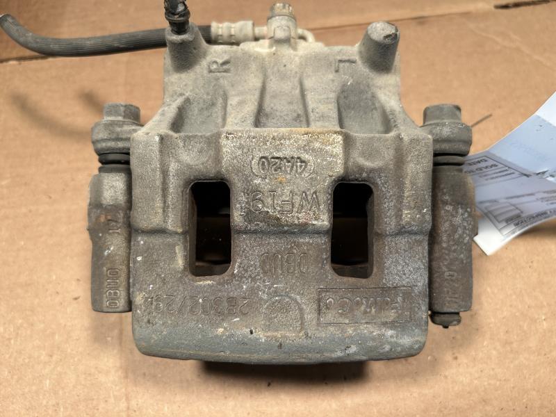 Brake Caliper from a 2014 Ford Edge, front, right side, photo 1