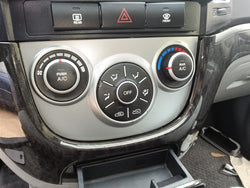 Climate Control Panel from a 2009 Hyundai Santa Fe, photo 1