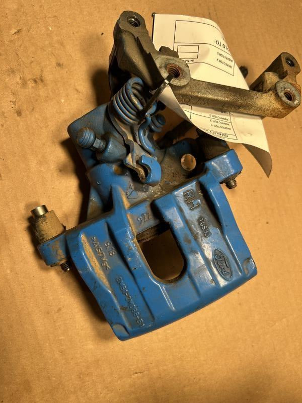 Brake Caliper from a 2012 Ford Focus, rear, right side, photo 1