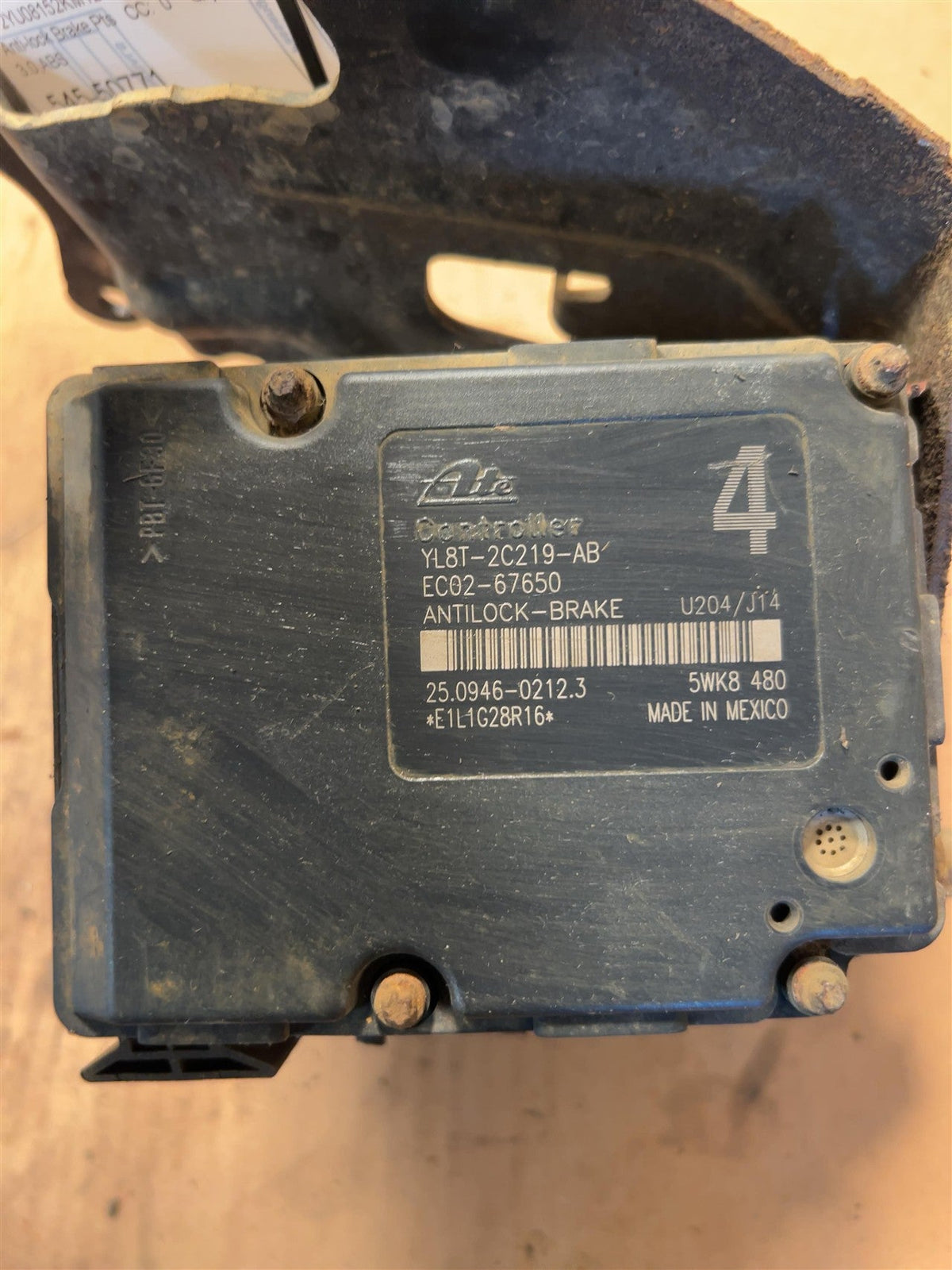 ABS Pump Module from a 2002 Mazda Tribute, photo 1