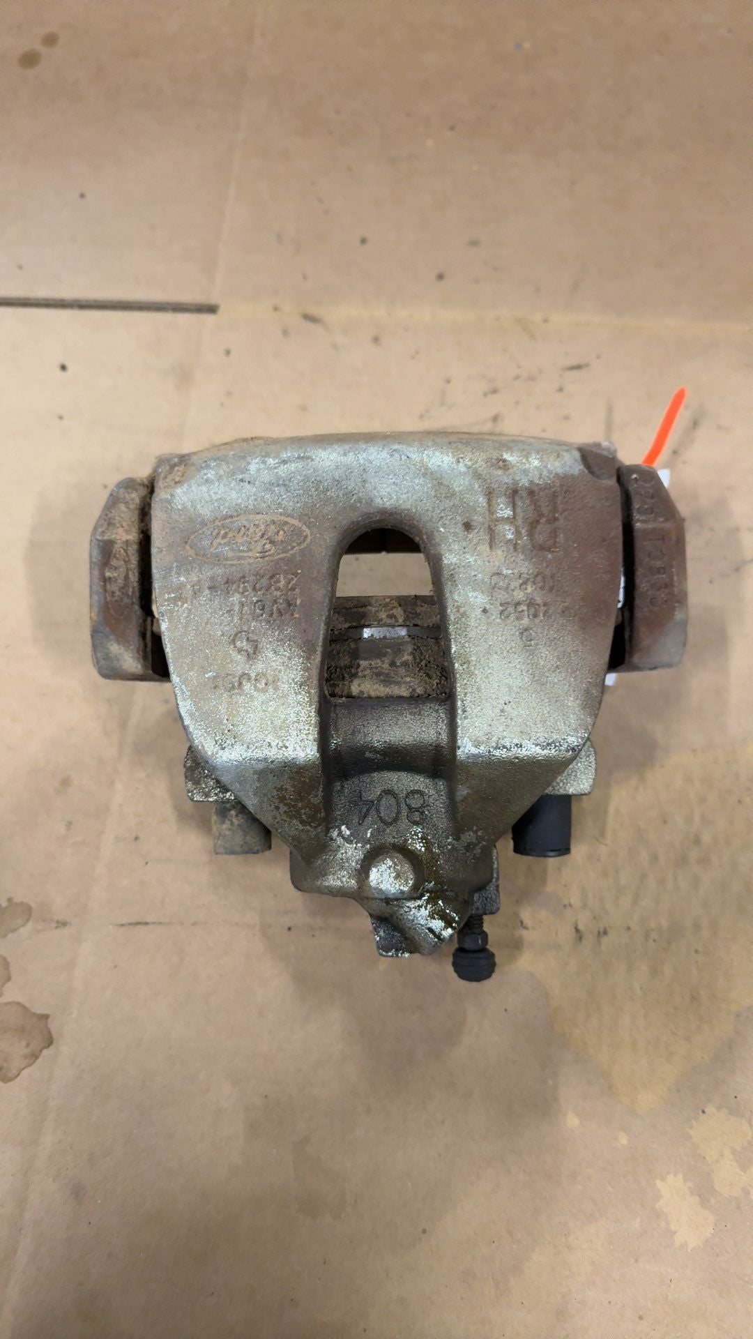 Brake Caliper from a 2012 Ford Focus, front, right side, photo 1