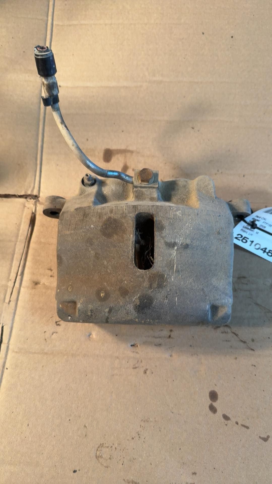 Brake Caliper from a 2006 Ford F-150, front, left side, photo 1
