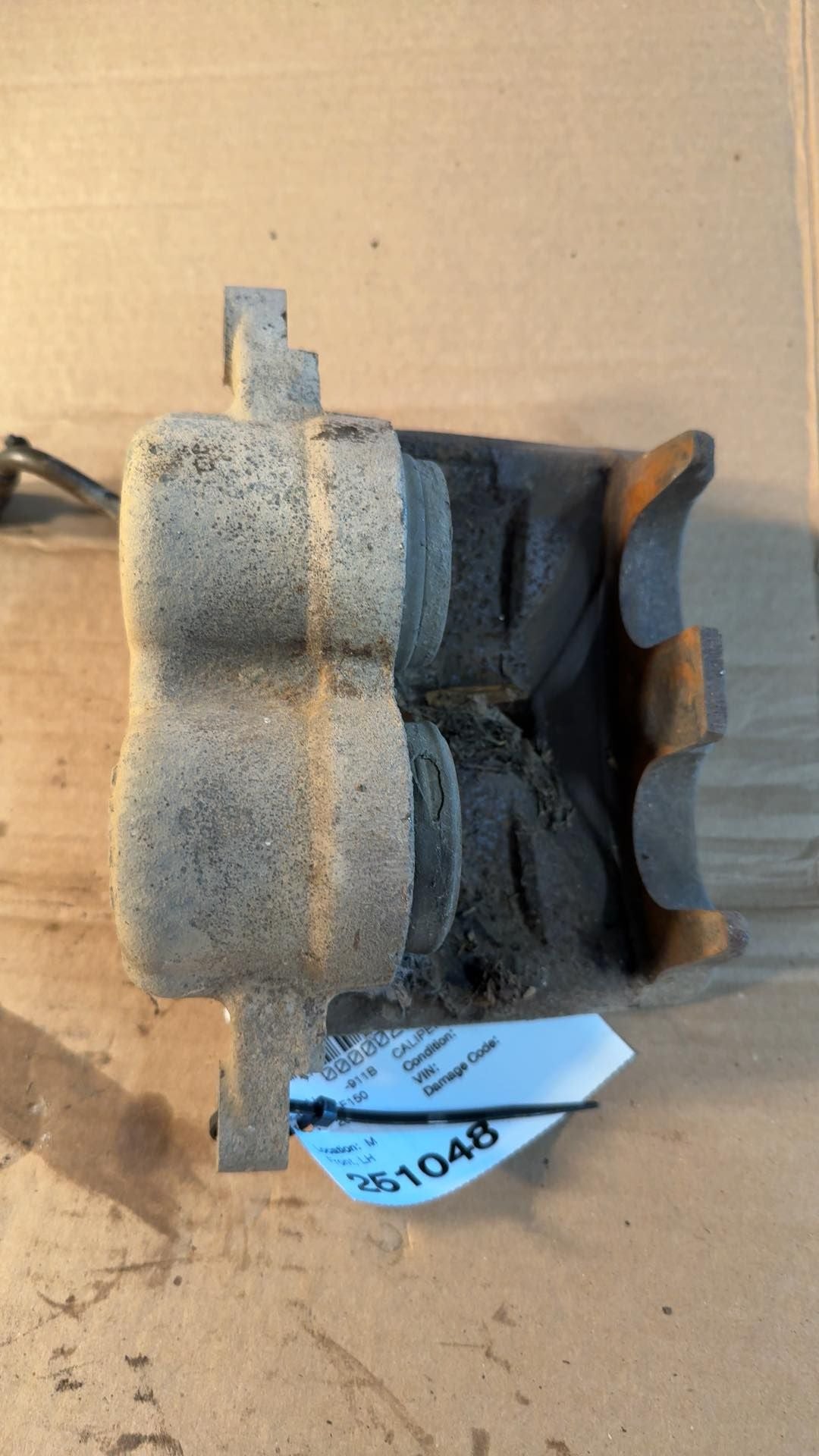 Brake Caliper from a 2006 Ford F-150, front, left side, photo 2