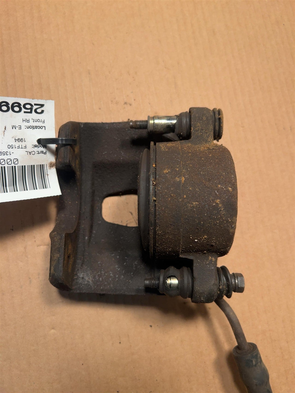 Brake Caliper from a 1994 Ford F-150, front, right side, photo 2