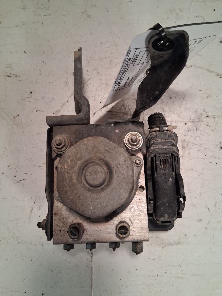 ABS Pump Module from a 2012 Nissan Versa, photo 1