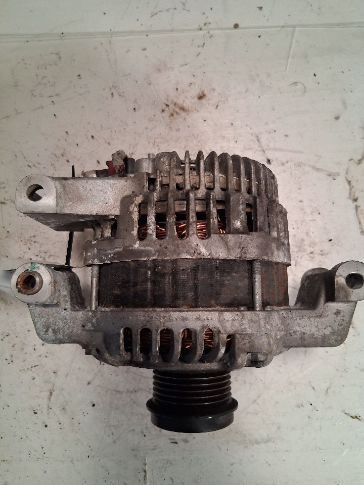 Alternator from a 2012 Nissan Versa, photo 1