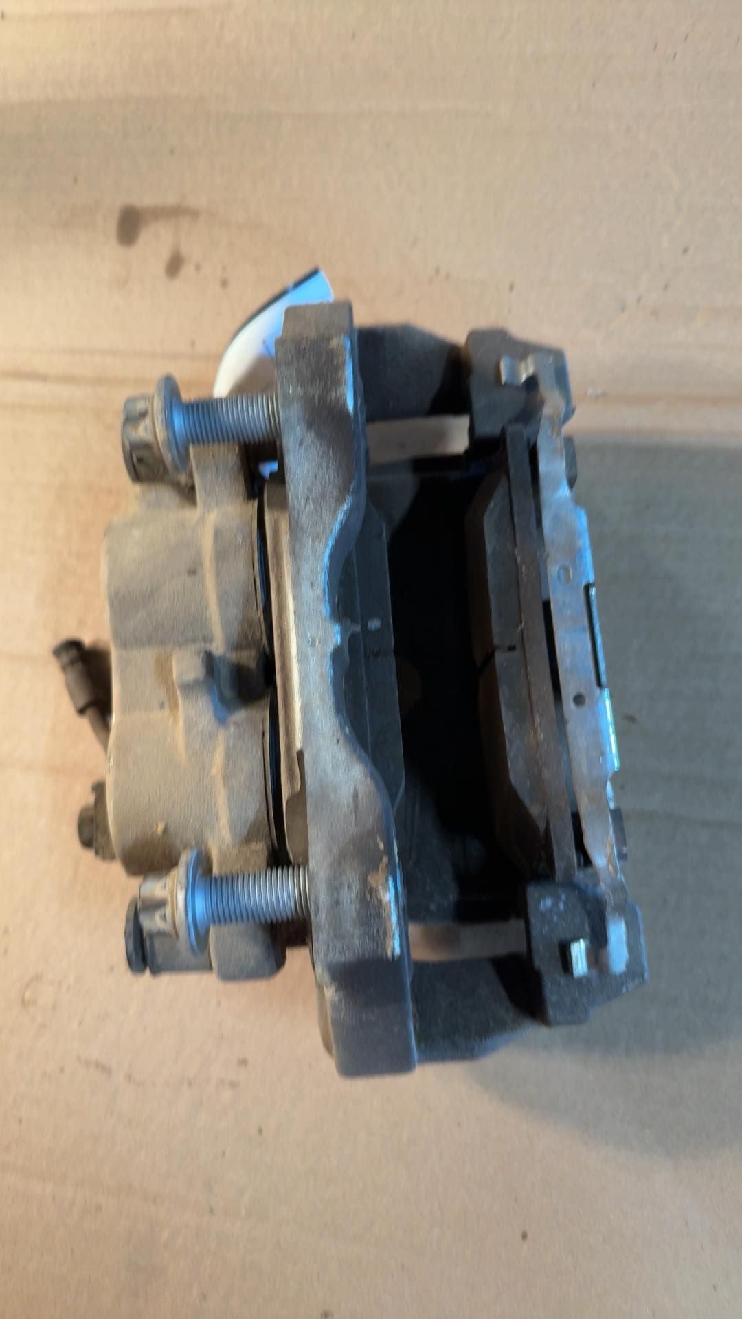 Brake Caliper from a 2017 Jeep Grand Cherokee, front, left side, photo 2