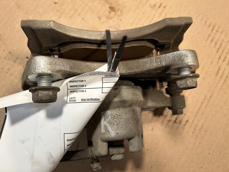 Brake Caliper from a 2016 Jeep Patriot, front, right side, photo 1