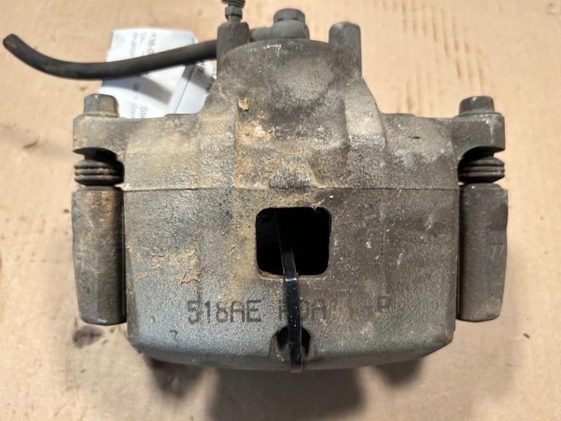 Brake Caliper from a 2016 Jeep Patriot, front, right side, photo 2