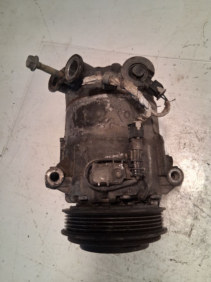 AC Compressor from a 2015 Chevrolet Malibu, photo 1