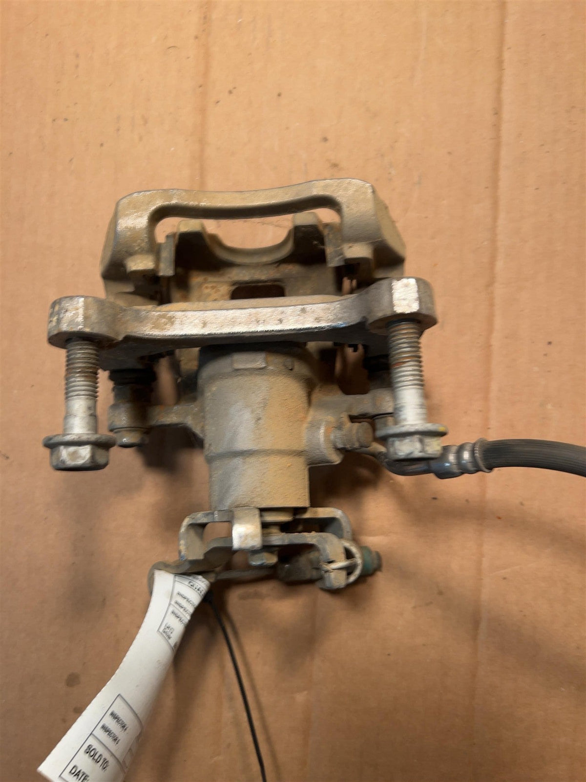 Brake Caliper from a 2018 Chevrolet Malibu, rear, left side, photo 2