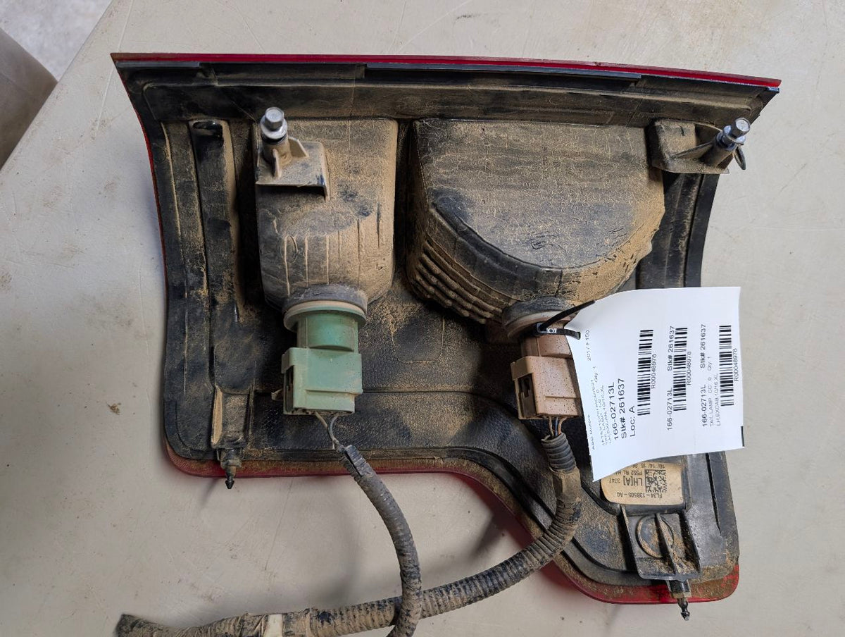 Tail Light from a 2017 Ford F-150, left side, photo 6