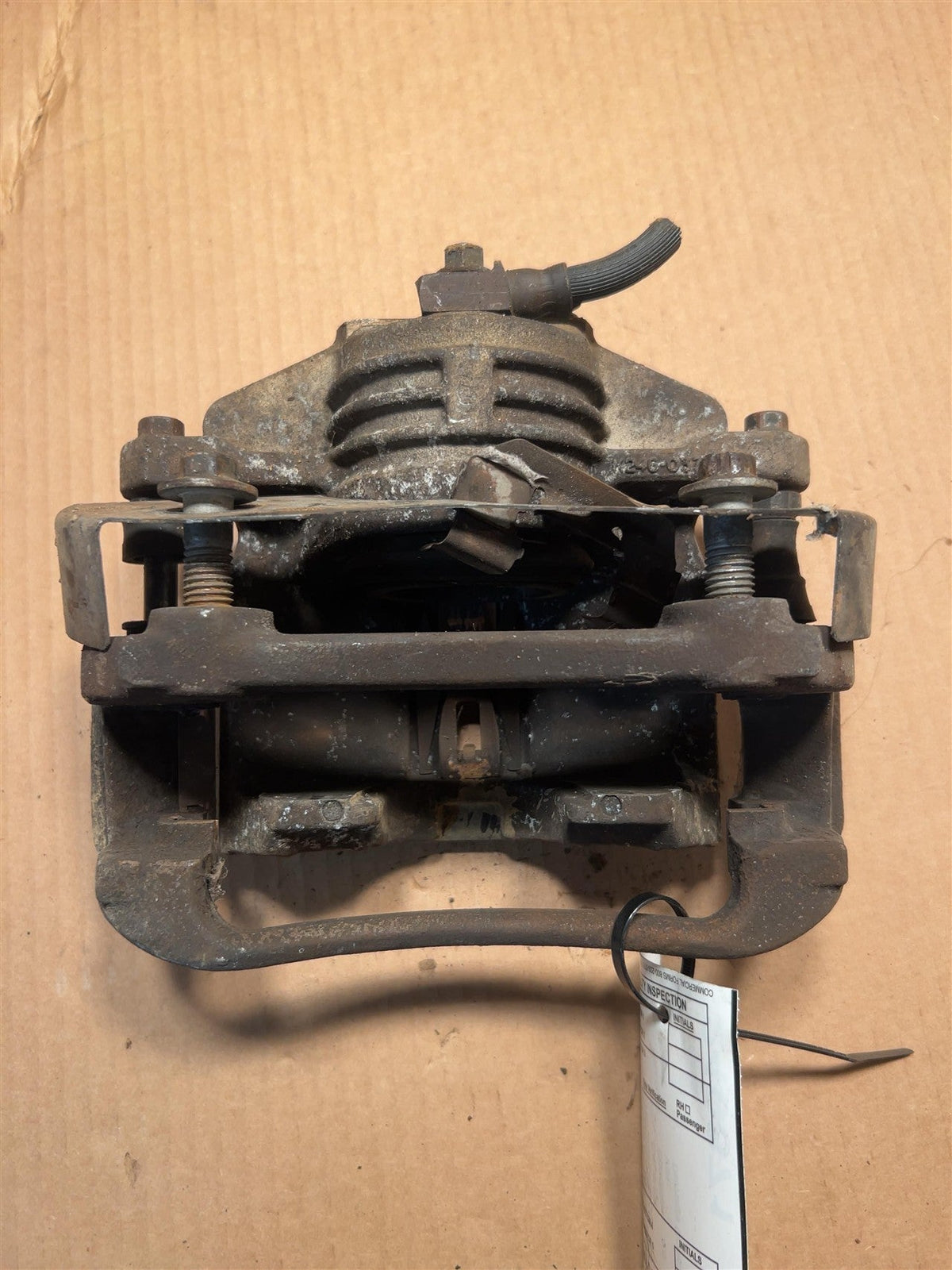 Brake Caliper from a 2004 Pontiac Grand Am, front, right side, photo 2