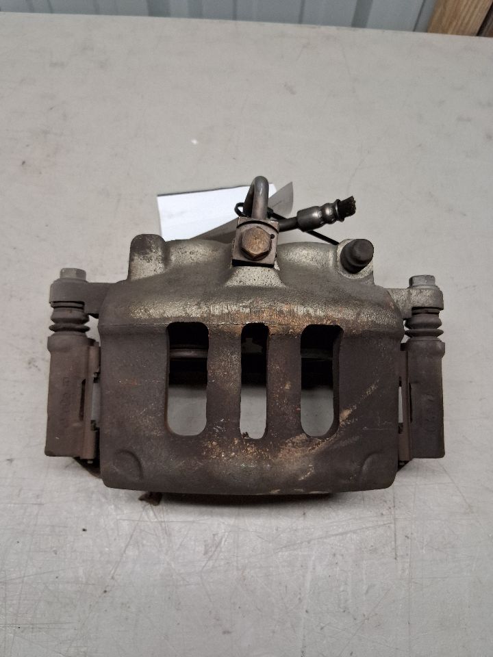 Brake Caliper from a 2009 Mercury Grand Marquis, front, right side, photo 1
