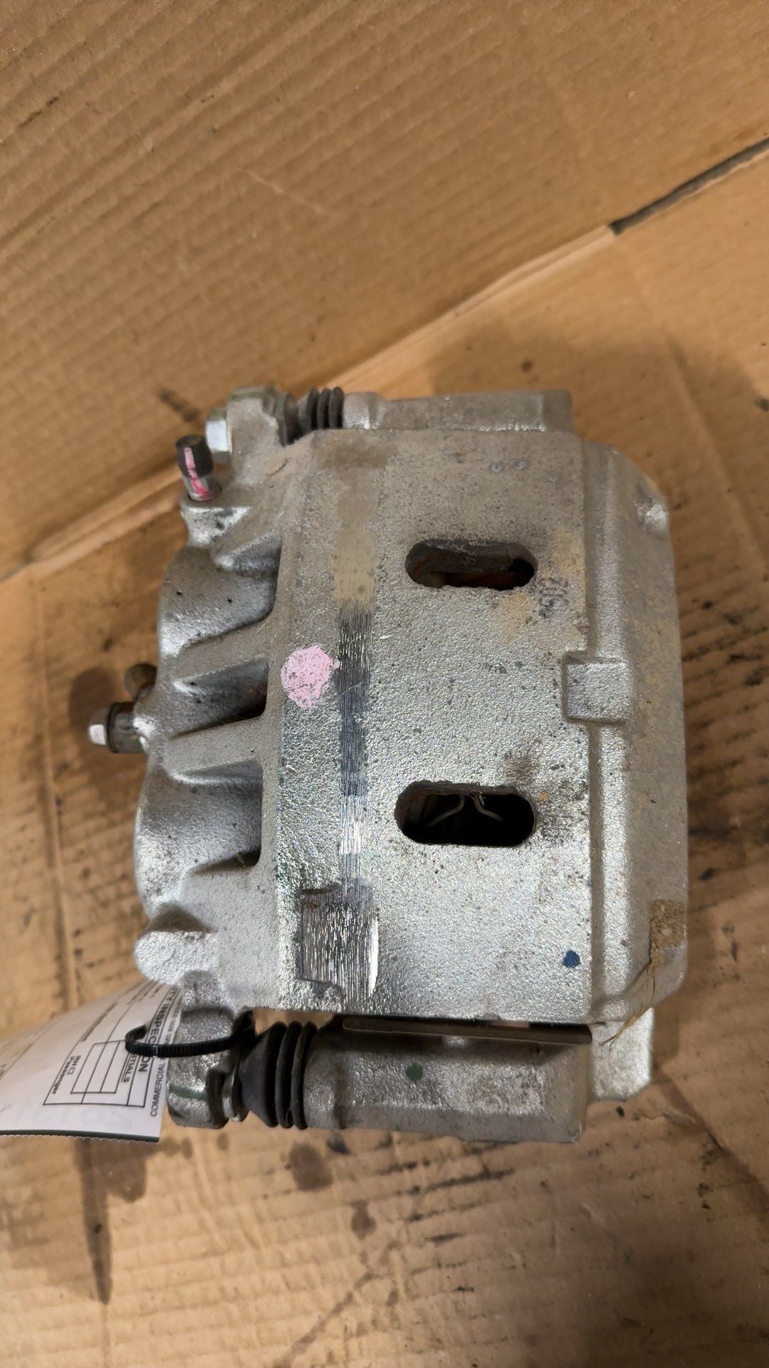 Brake Caliper from a 2020 Nissan Titan, front, left side, photo 1