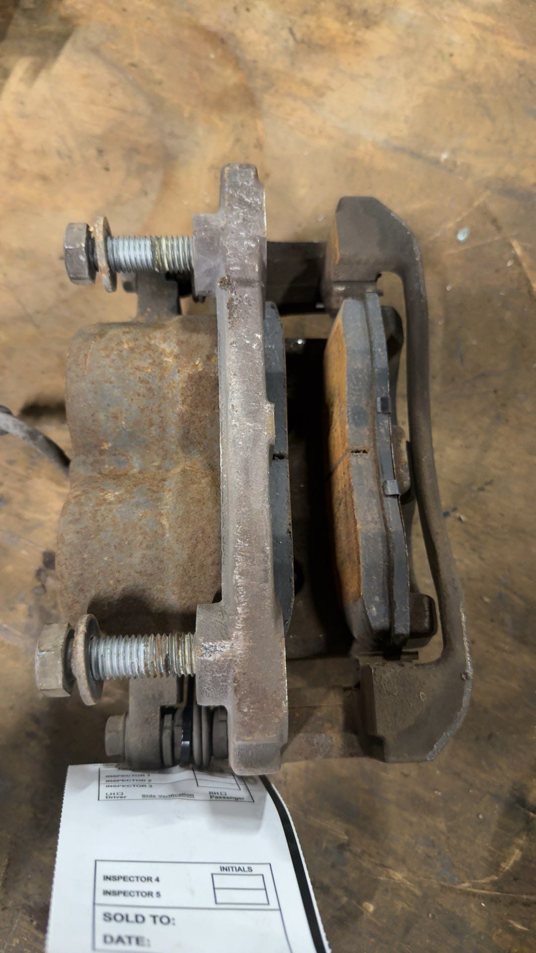 Brake Caliper from a 2006 Nissan, front, left side, photo 2