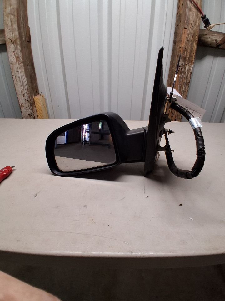 Side View Mirror from a 2005 Ford Freestar, left side, photo 3