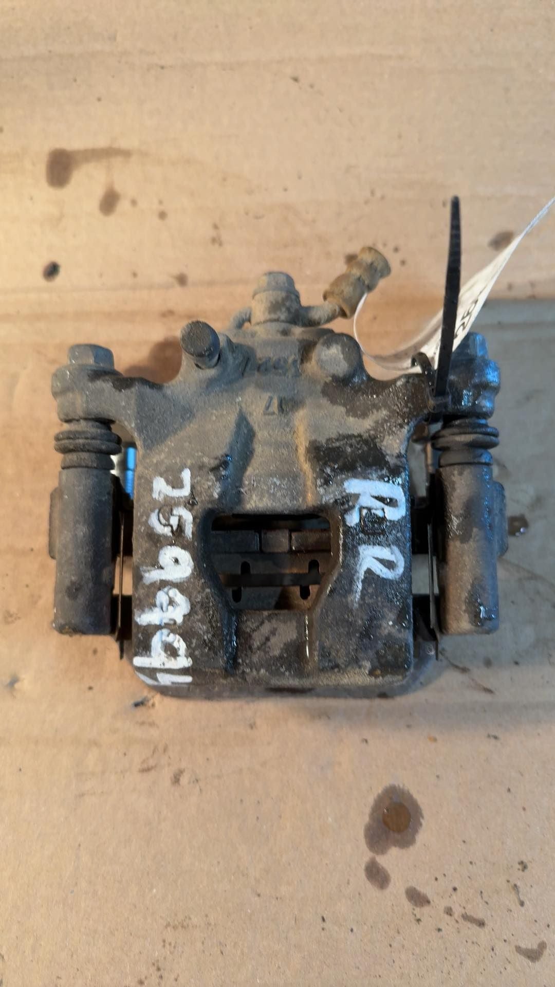 Brake Caliper from a 2017 Nissan Altima, rear, right side, photo 1