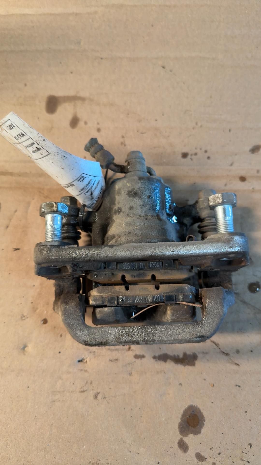 Brake Caliper from a 2017 Nissan Altima, rear, right side, photo 2