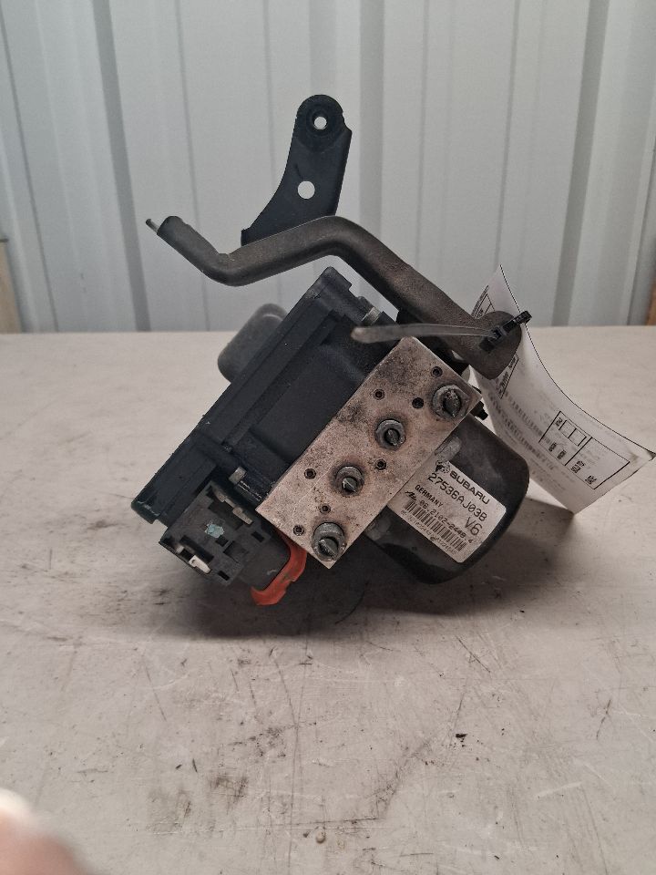 ABS Pump Module from a 2014 Subaru Legacy, photo 1