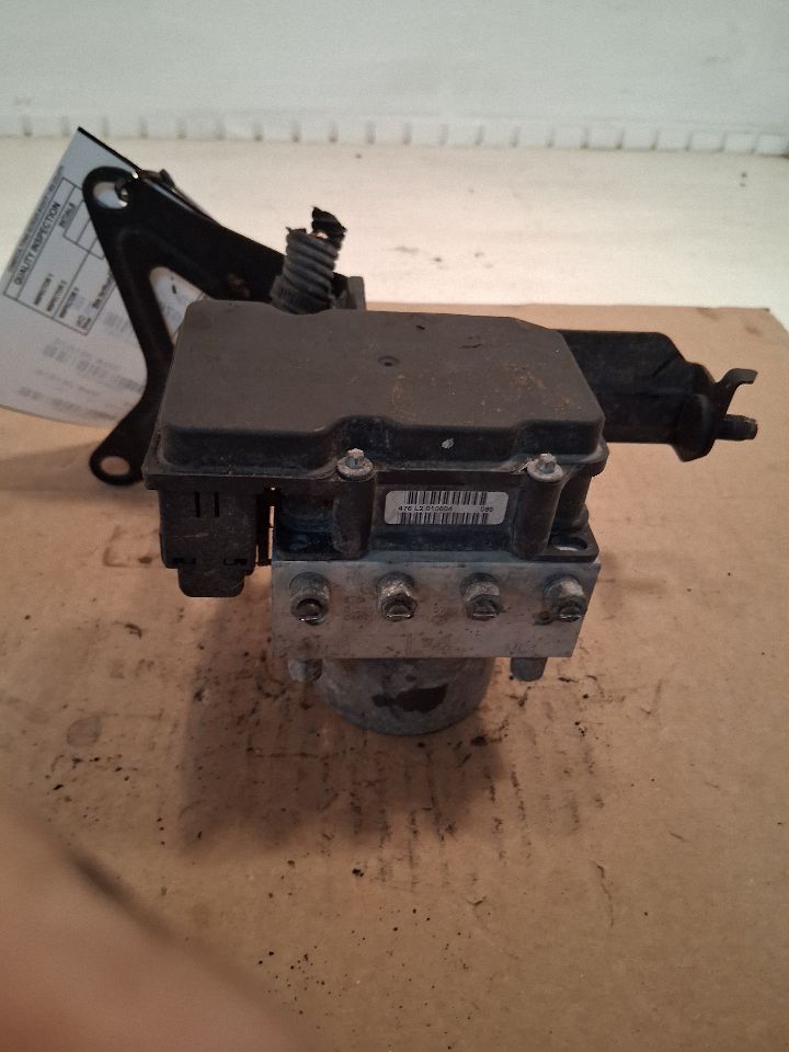 ABS Pump Module from a 2005 Subaru Forester, photo 1