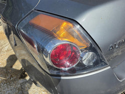 Tail Light from a 2009 Nissan Altima, left side, photo 1