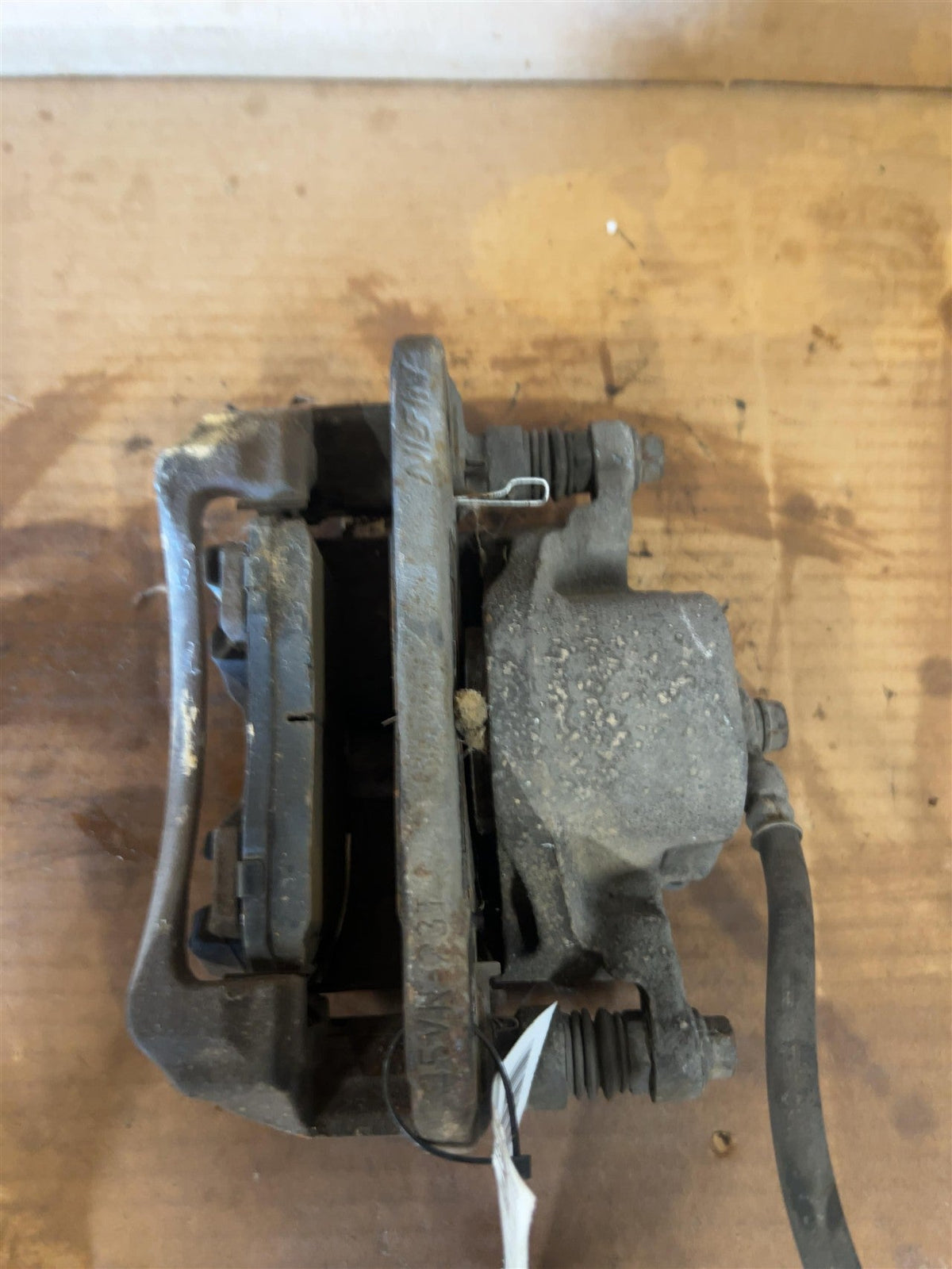 Brake Caliper from a 2003 Honda Accord, front, left side, photo 1