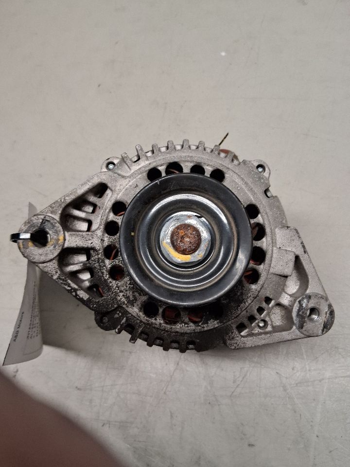 Alternator from a 1995 Nissan 240SX, photo 1
