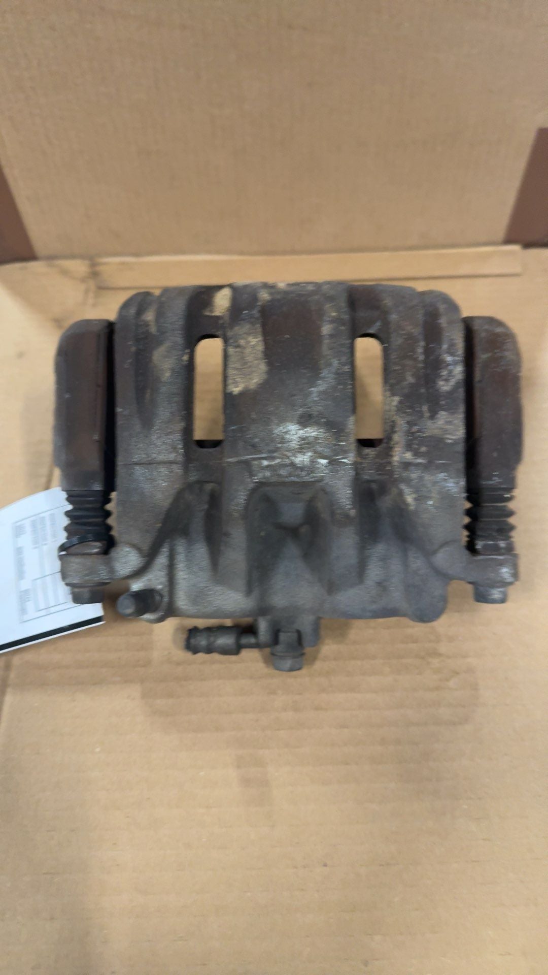 Brake Caliper from a 2009 Honda Odyssey, front, left side, photo 1