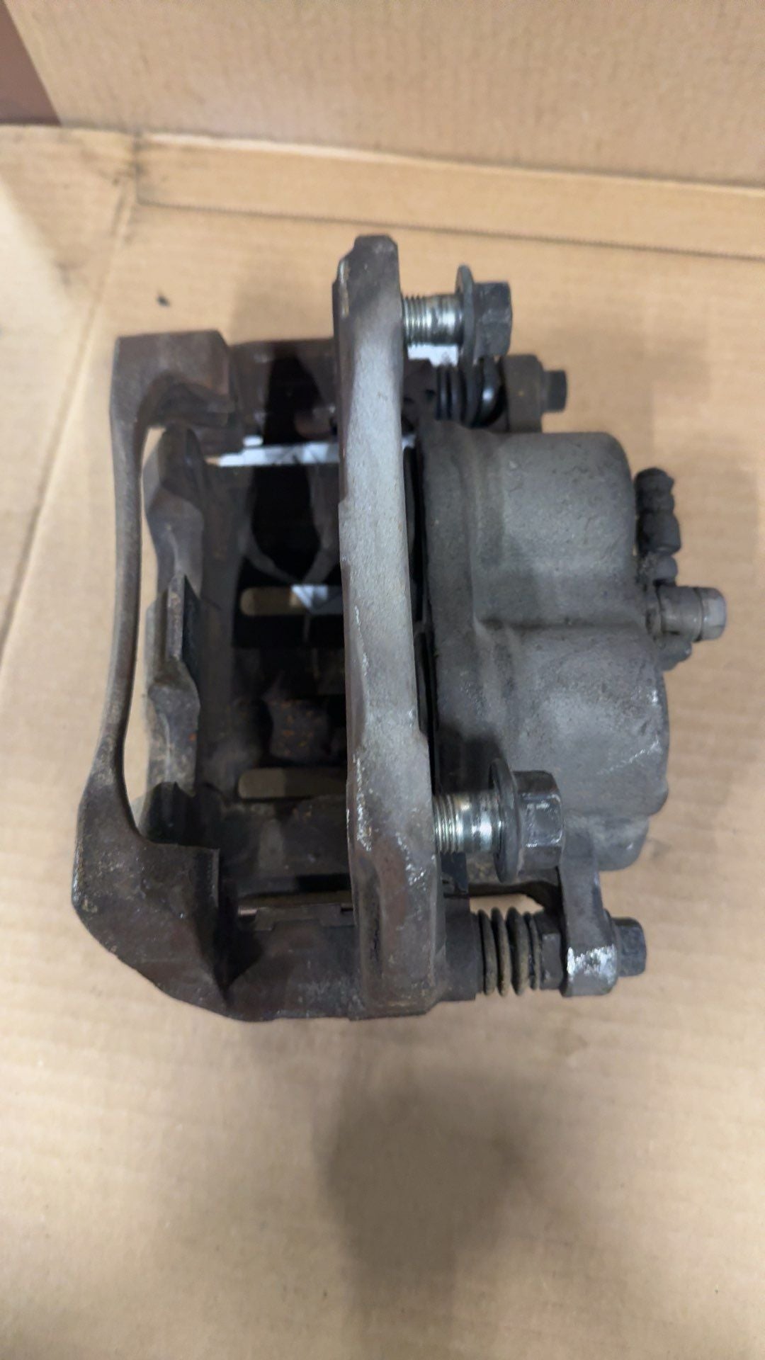 Brake Caliper from a 2009 Honda Odyssey, front, left side, photo 2