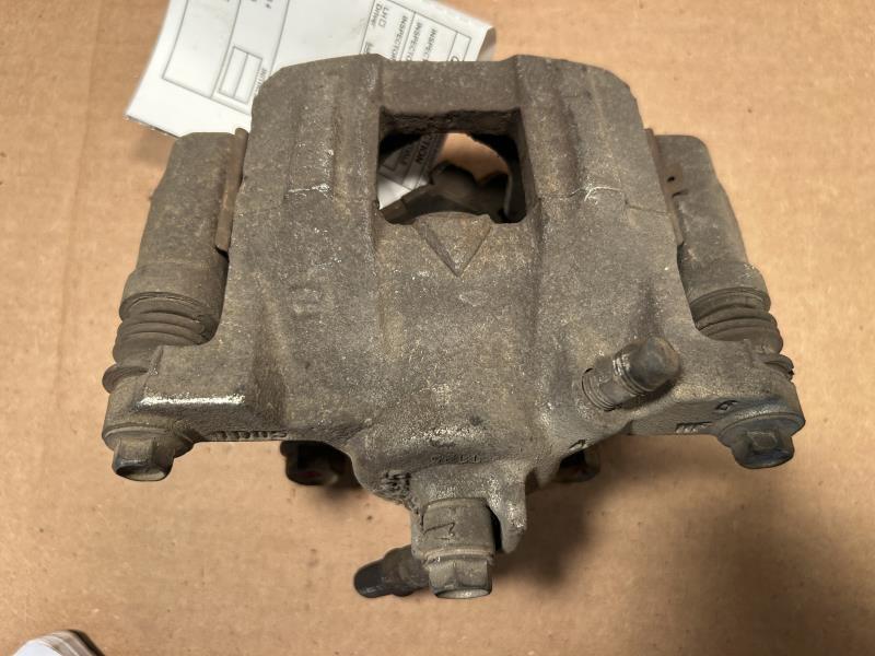 Brake Caliper from a 2011 Honda Odyssey, rear, left side, photo 1