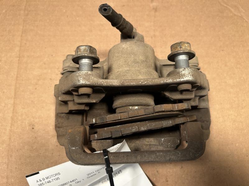 Brake Caliper from a 2011 Honda Odyssey, rear, left side, photo 2