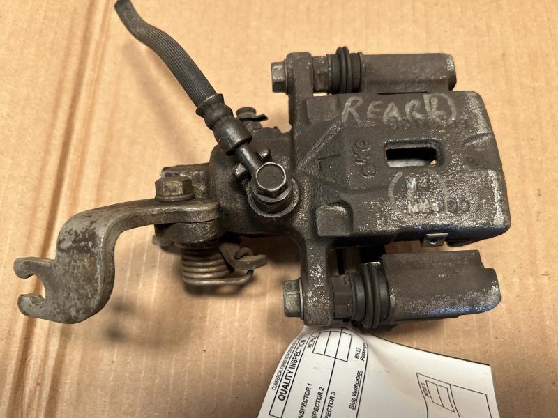 Brake Caliper from a 2009 Kia Spectra, rear, left side, photo 1