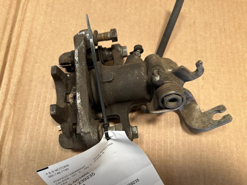 Brake Caliper from a 2009 Kia Spectra, rear, left side, photo 2