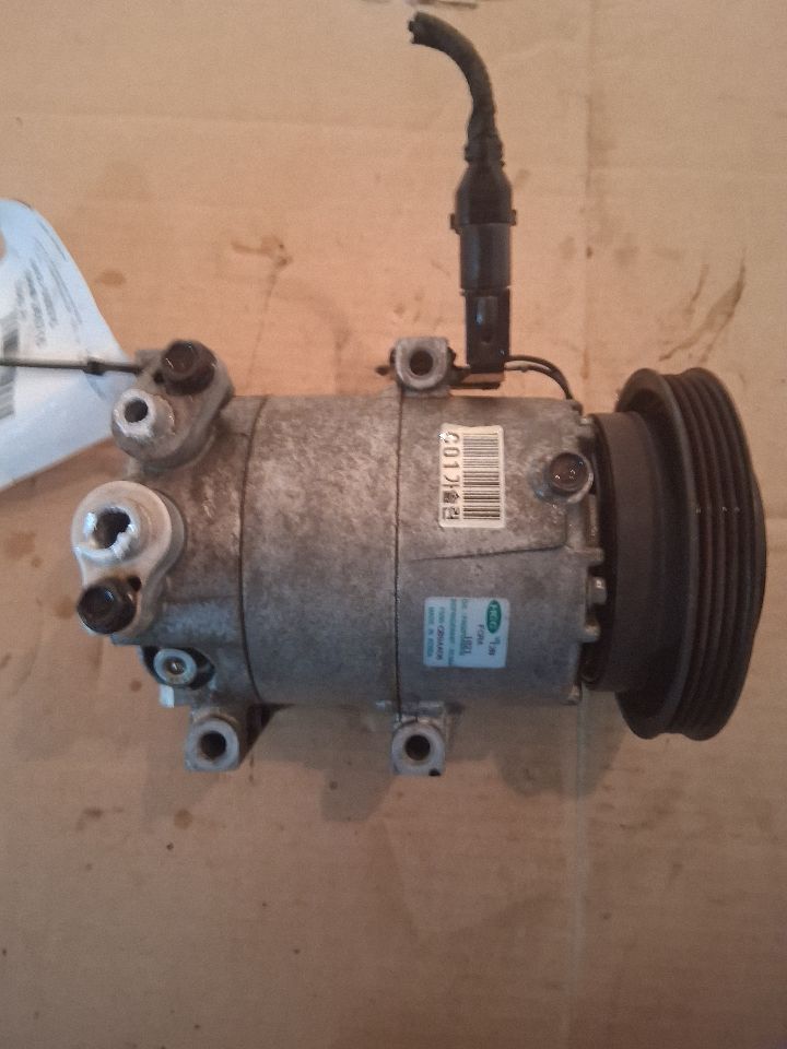 AC Compressor from a 2010 Hyundai Accent, photo 1