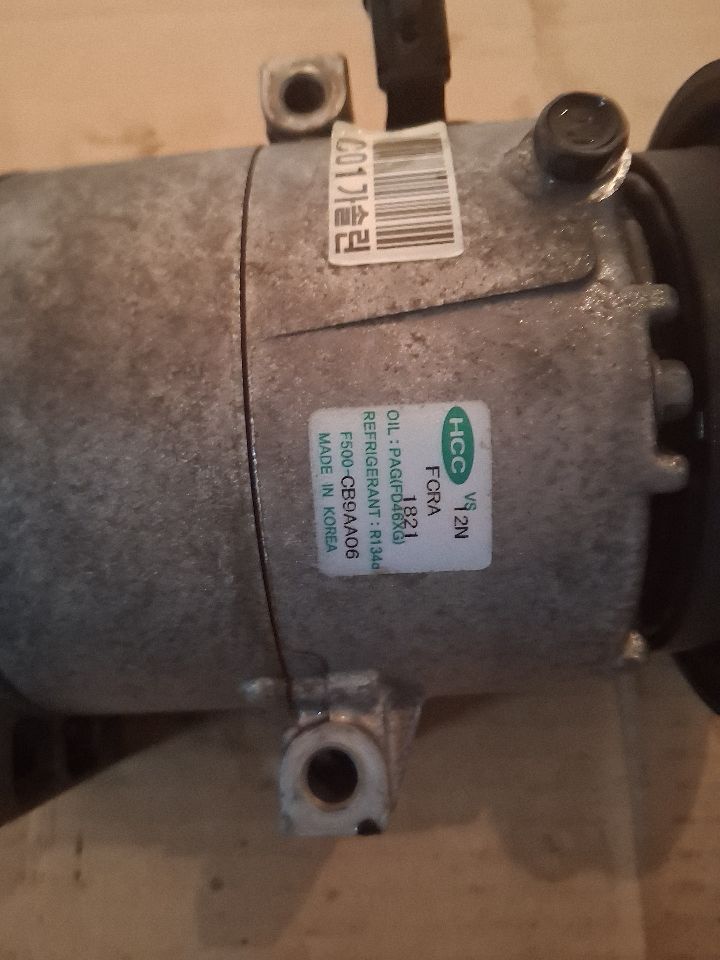 AC Compressor from a 2010 Hyundai Accent, photo 2