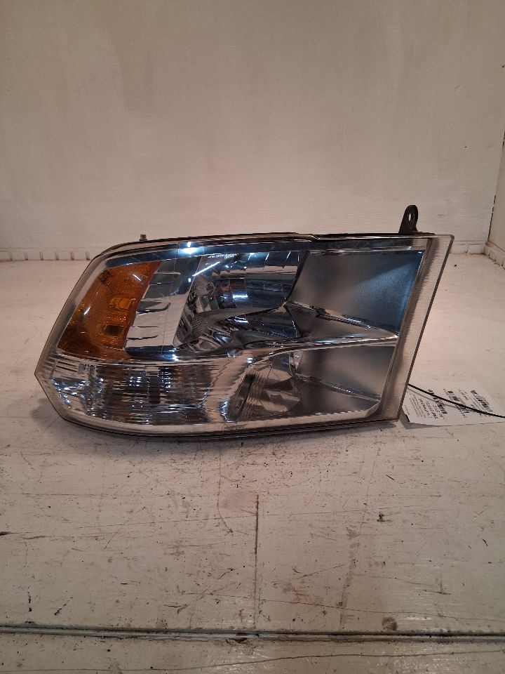 Headlight Assembly from a 2018 Ram 1500, right side, photo 2