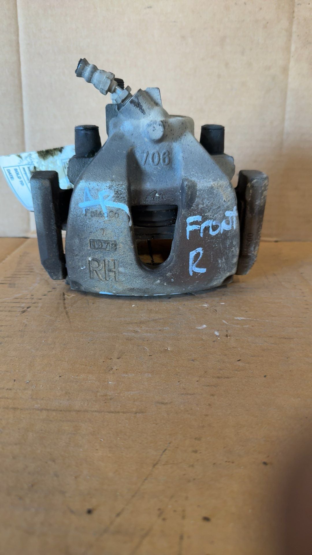 Brake Caliper from a 2012 Mazda 3, front, right side, photo 1