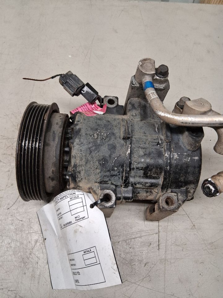 AC Compressor from a 2012 Hyundai Accent, photo 1