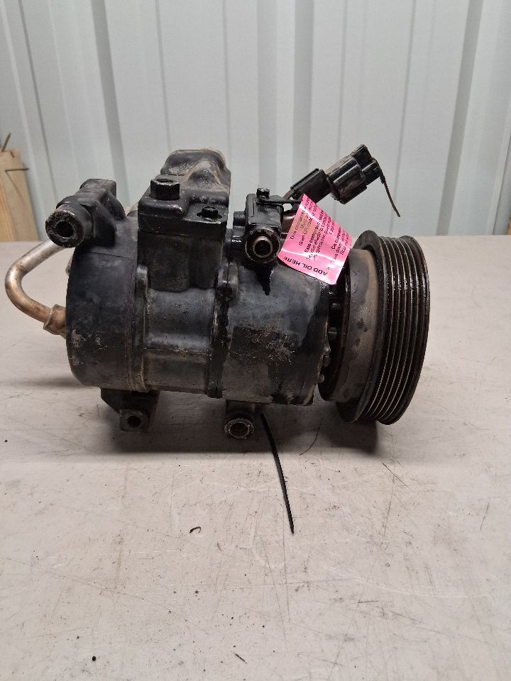 AC Compressor from a 2012 Hyundai Accent, photo 2