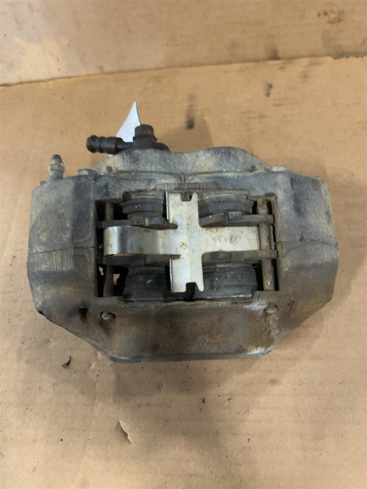 Brake Caliper from a 2004 Toyota Tacoma, front, right side, photo 1