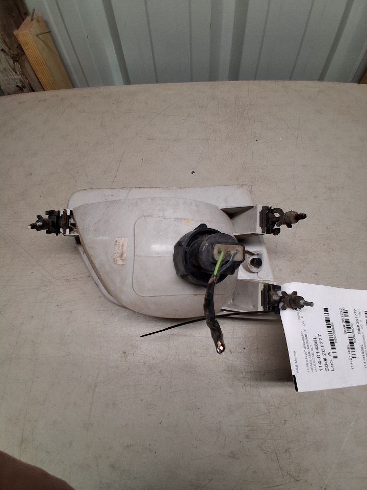 Headlight Assembly from a 2002 Ford F-150, left side, photo 3