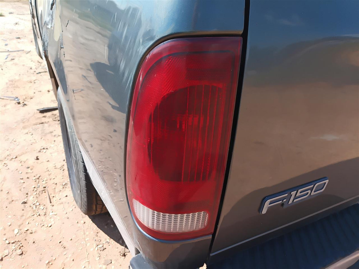 Tail Light from a 2002 Ford F-150, left side, photo 1