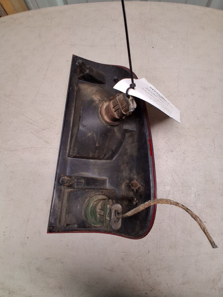 Tail Light from a 2002 Ford F-150, left side, photo 3