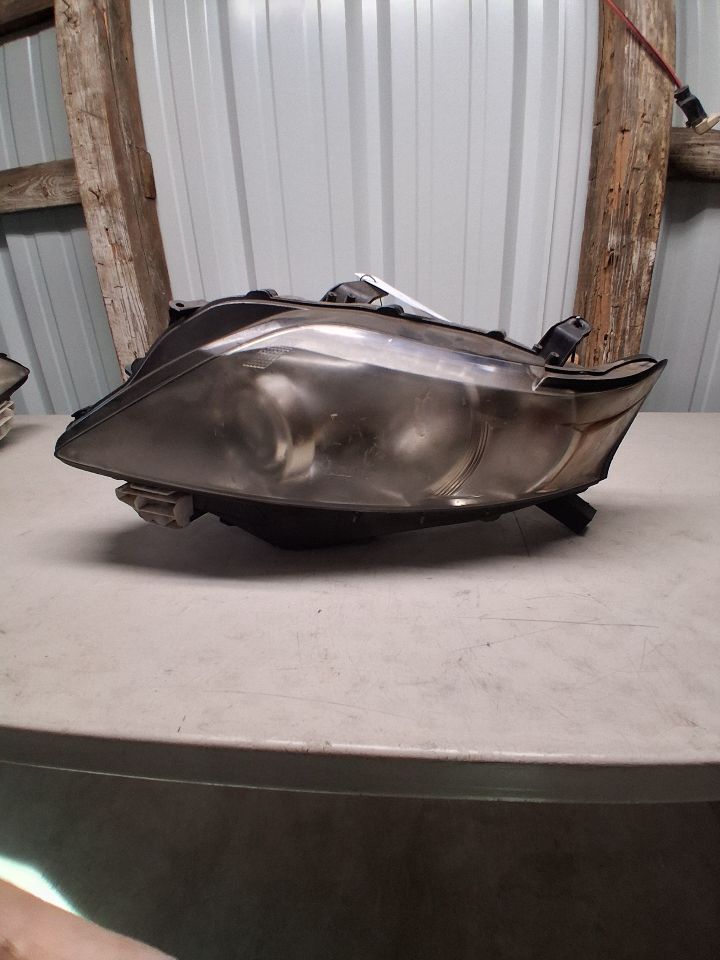Headlight Assembly from a 2011 Lexus RX350, left side, photo 1