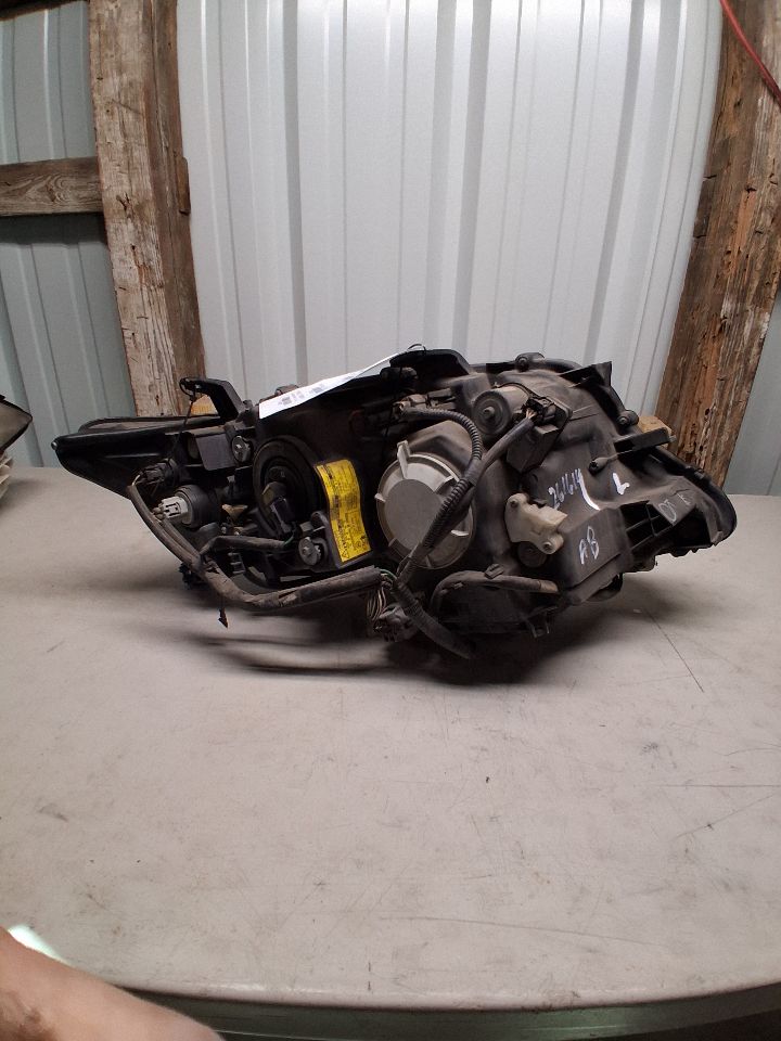 Headlight Assembly from a 2011 Lexus RX350, left side, photo 2