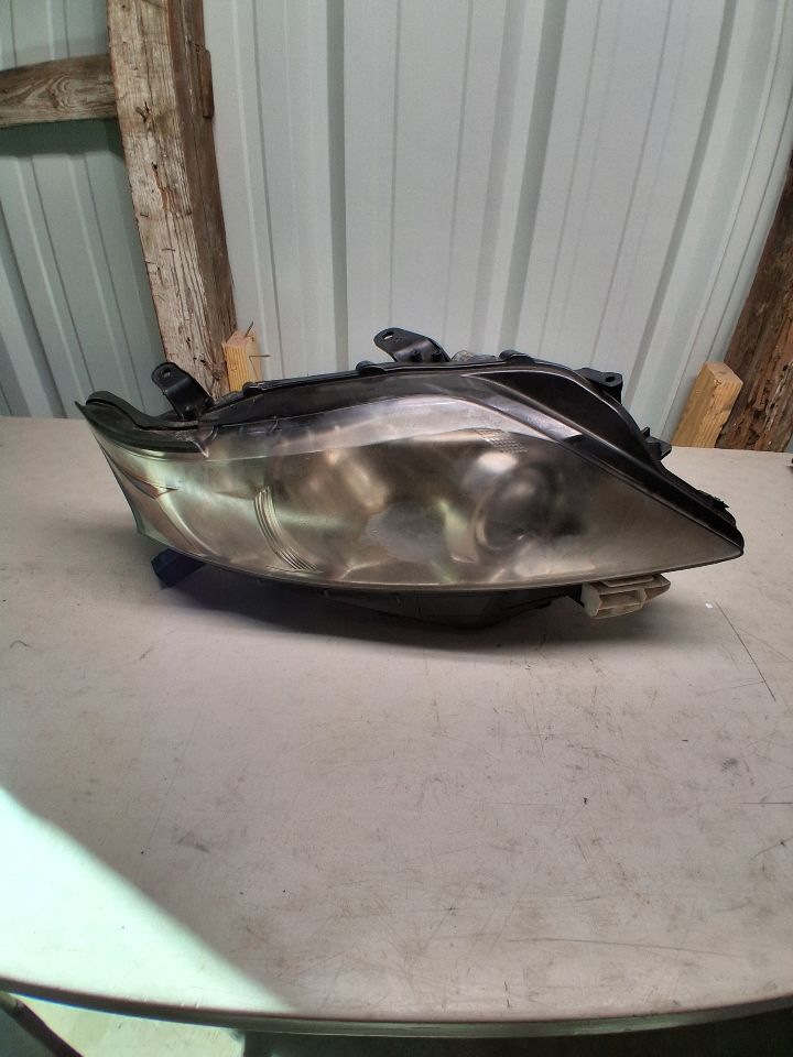 Headlight Assembly from a 2011 Lexus RX350, right side, photo 1