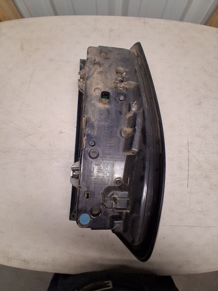 Tail Light from a 2023 GMC Sierra Denali 2500, right side, photo 4